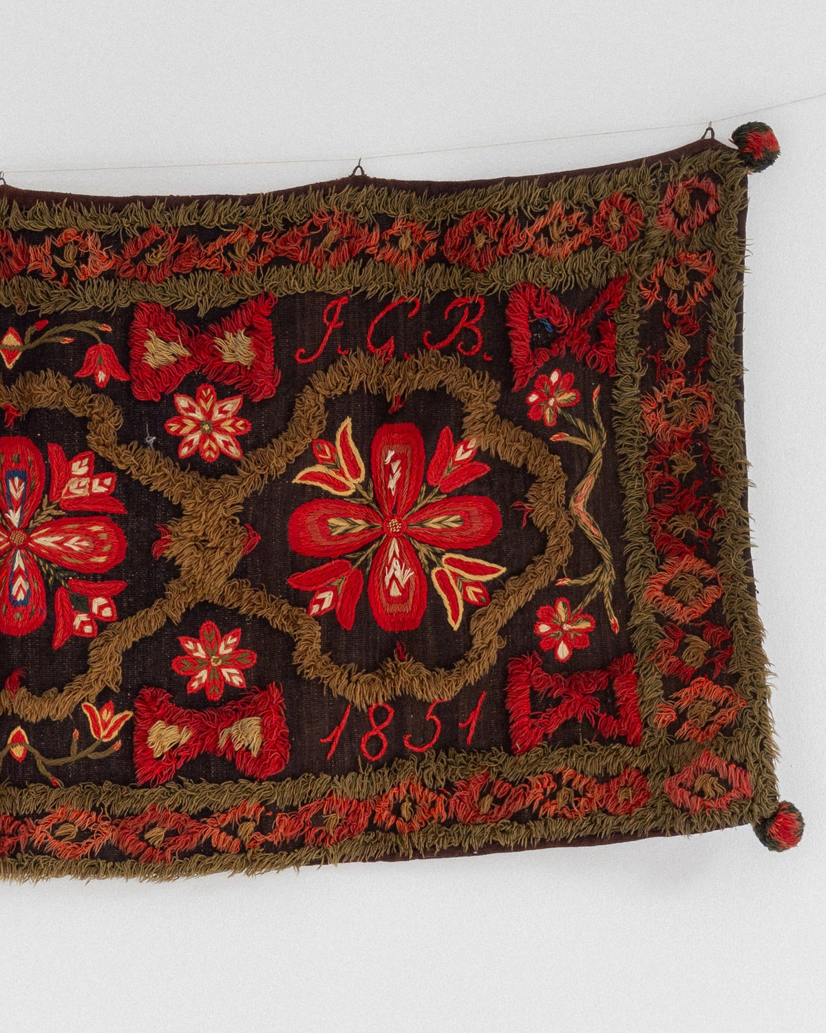Embroidered detail of 1851 Swedish wedding tapestry with floral motifs
