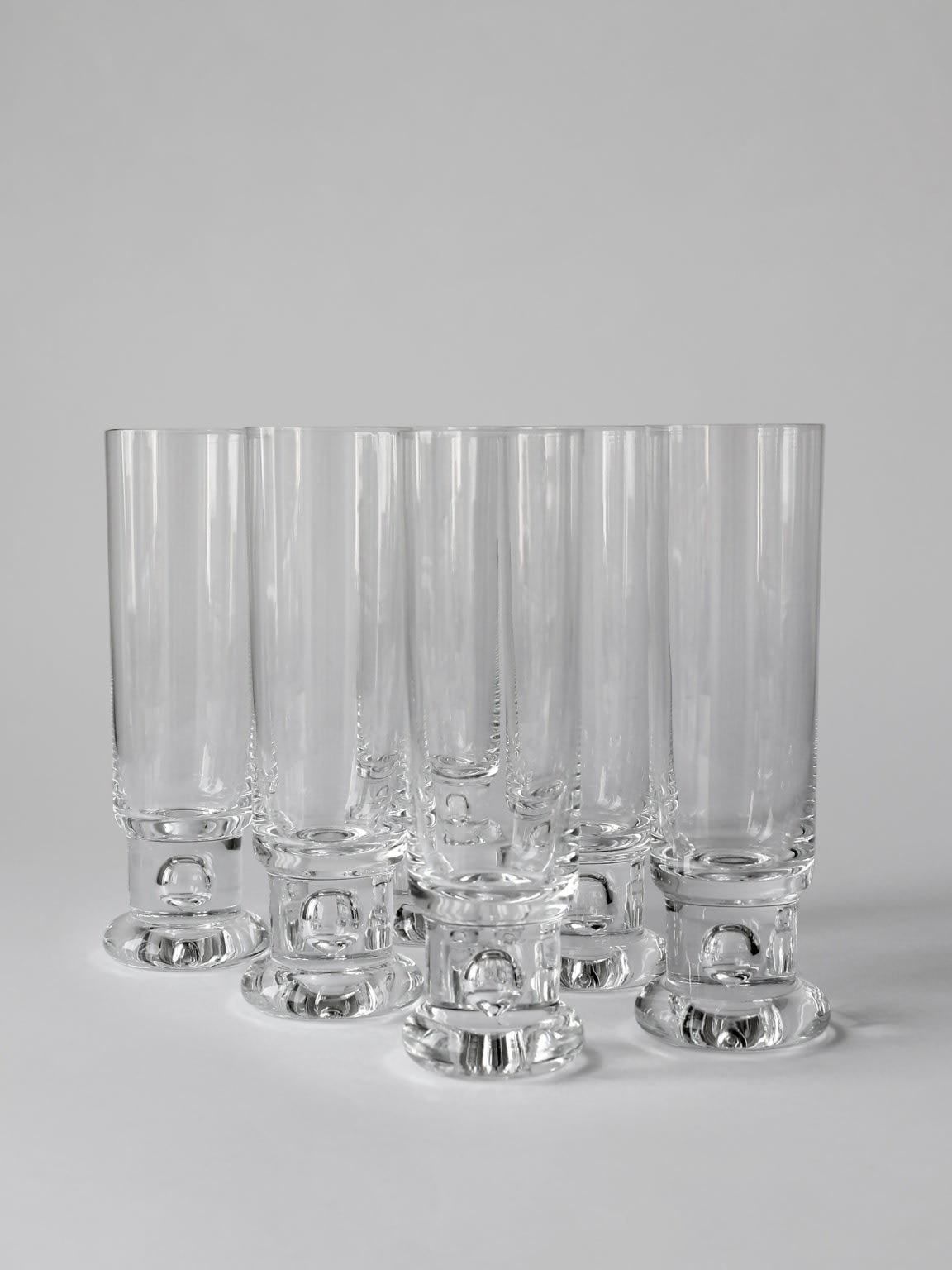 Set of six Tapio Wirkkala bubble base tall drinking glasses