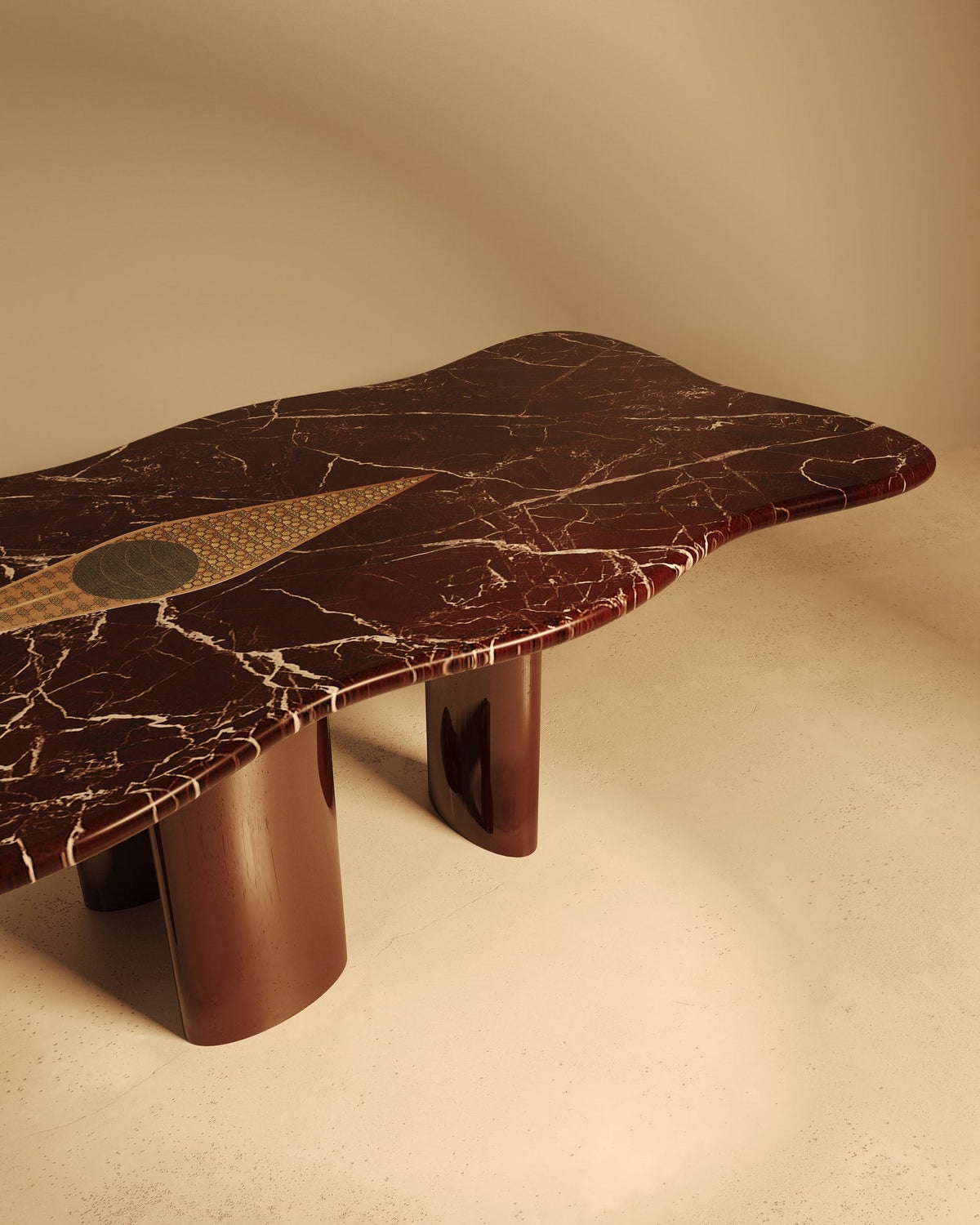 NAZAR dining table detail showing veined marble top with brass inlay