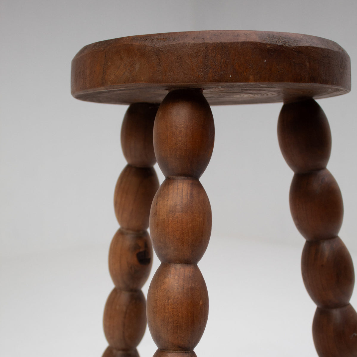 Bobbin Stool in Solid Walnut Wood — close-up