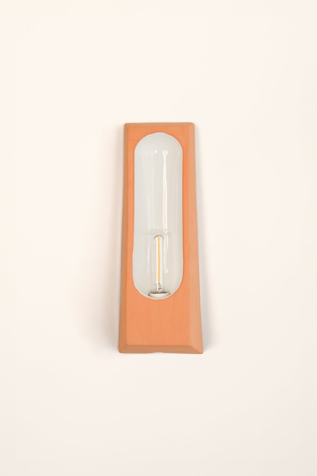 Alcove Terra B Mat — side angle showing terracotta base and glass bulb