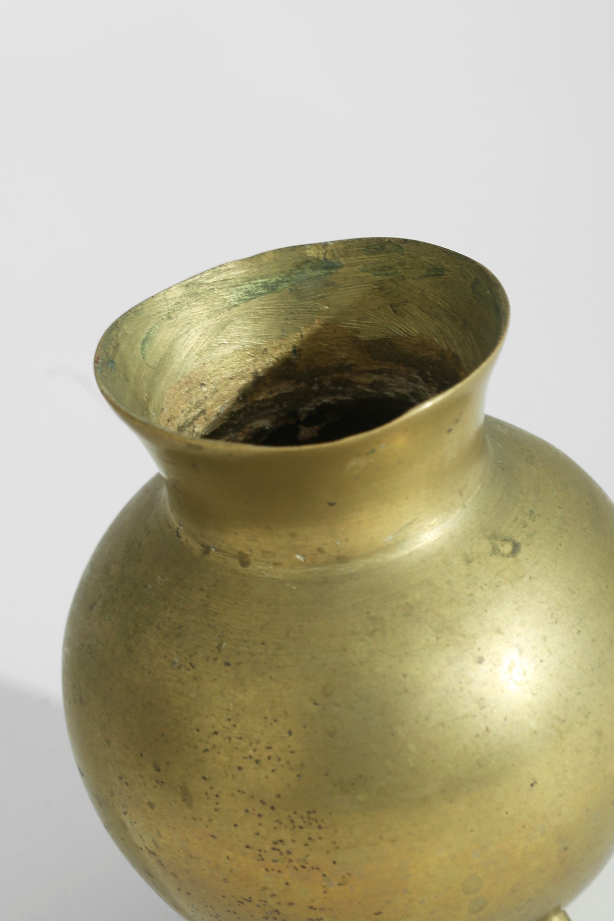 Brass Tripod Vessel — lifestyle setting