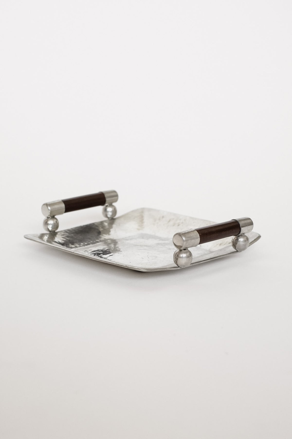 Hammered Pewter Tray with Wooden Handles by Schohaus — lifestyle setting