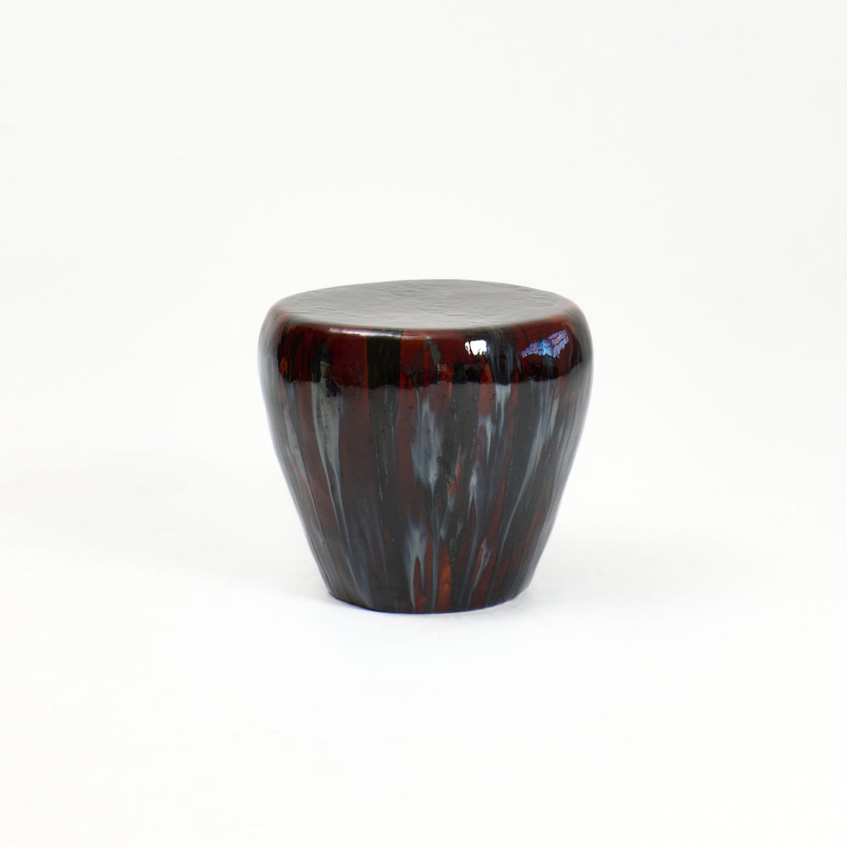 Ceramic Side Table (medium) — close-up of glossy dark red surface