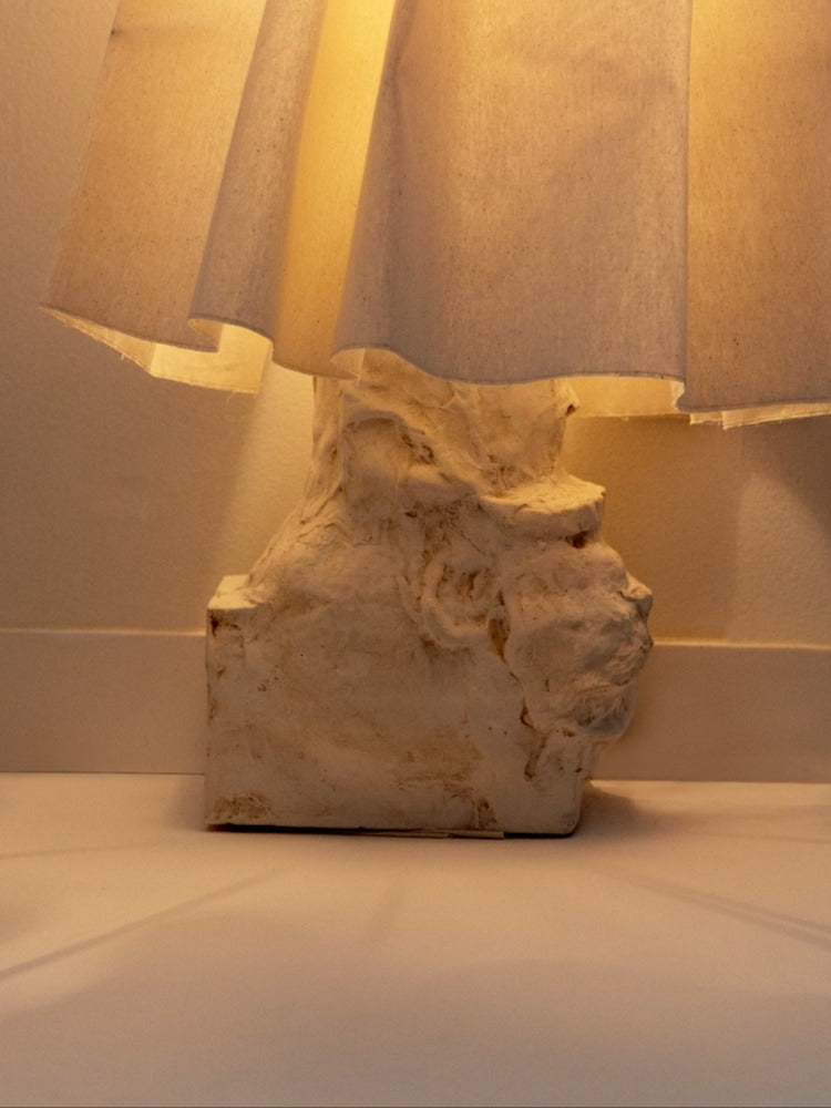Sculptural Light - ORA IV — side angle showing textured base and linen shade