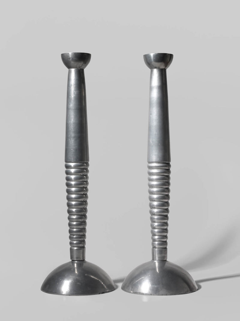 Pair Of Massive Rimmed Aluminum Candle Holders by Vintage Stories | The Oblist