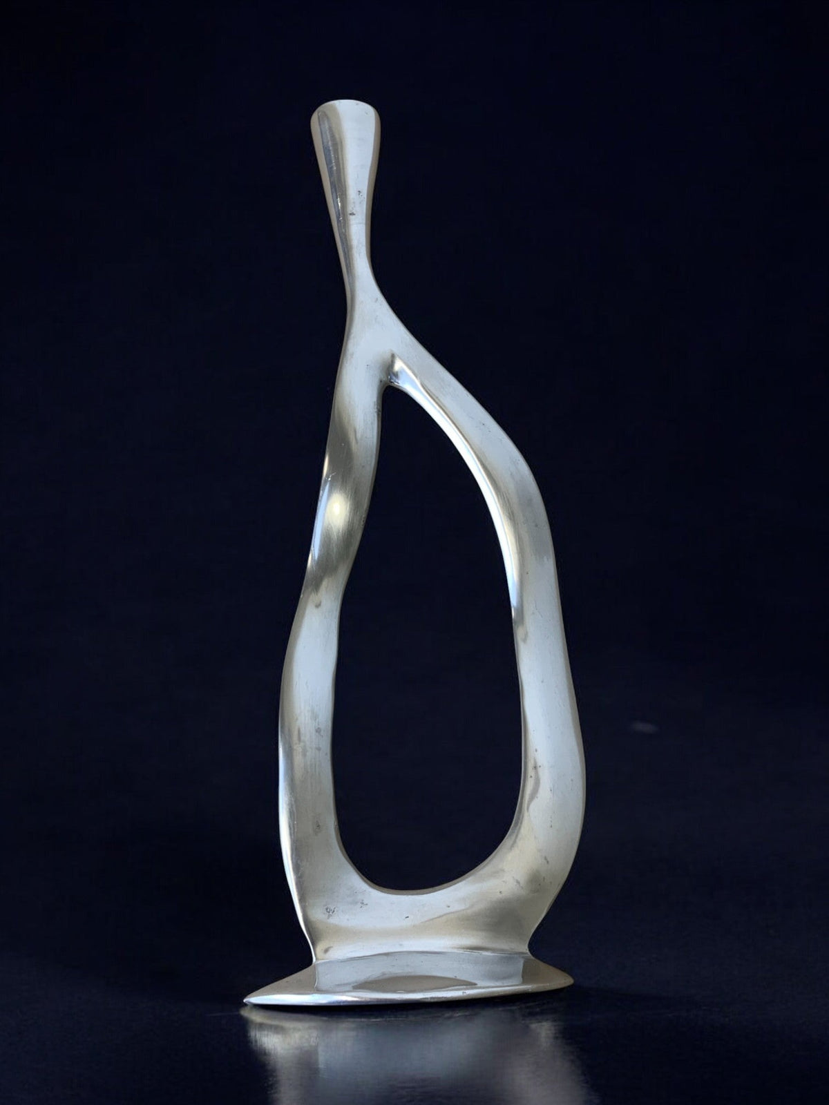 Biomorphic candleholder, solid aluminum, 1970's — detail view
