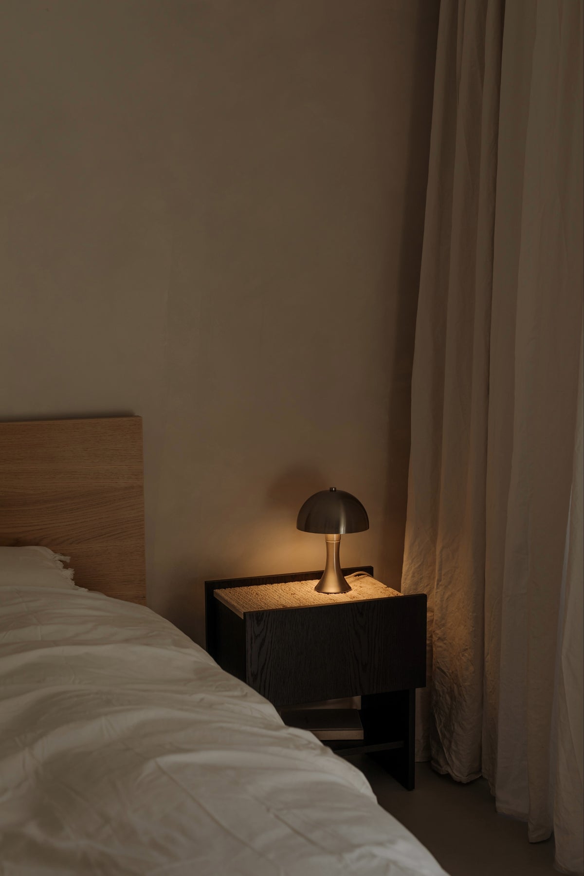 NOTO Night Stand — back view with dark wood finish and lamp