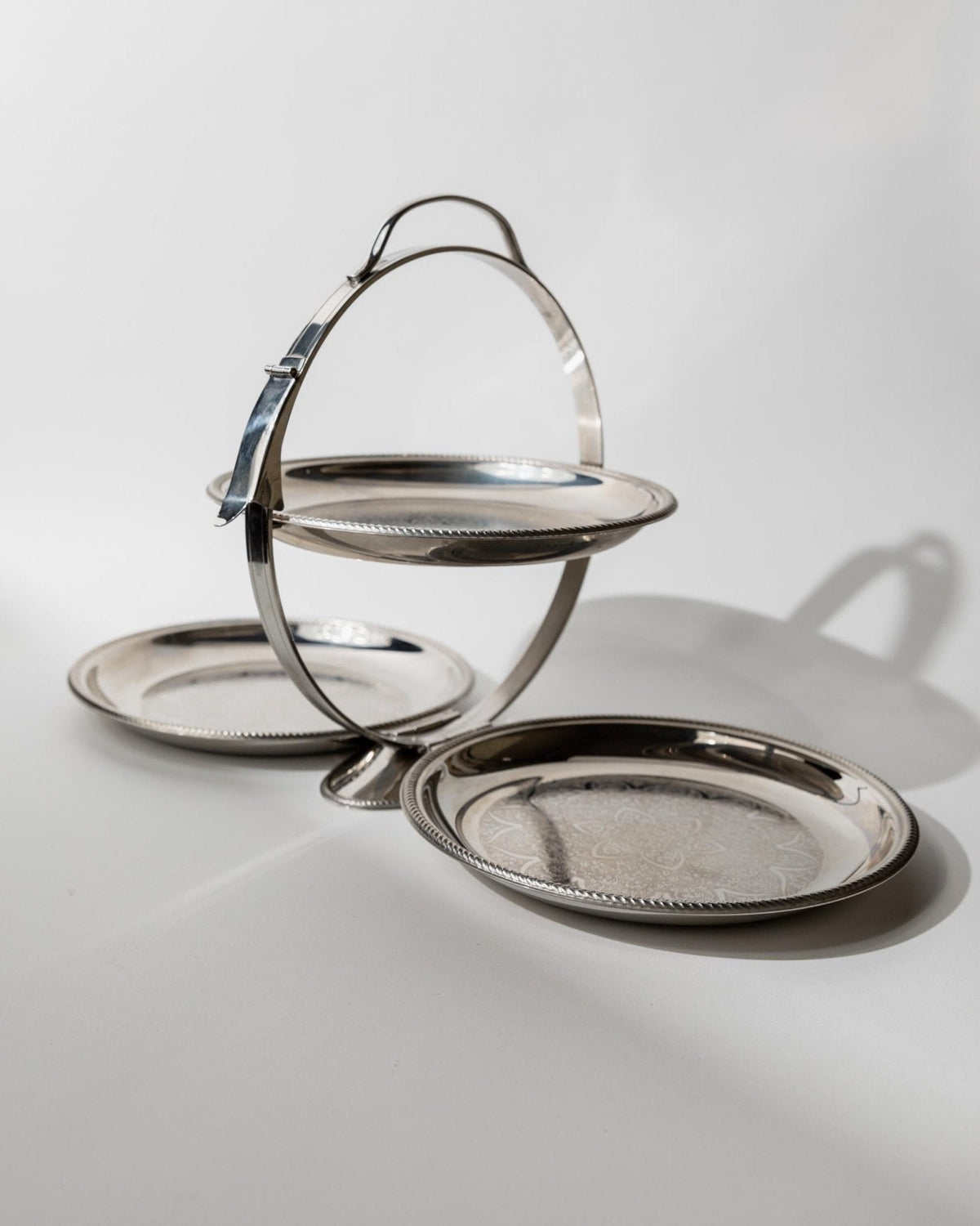 Vintage 1960s Folding Serving Tray Etagere, Three Engraved Stainless Steel Plates, Design by Carlo Alessi Mercury Series 898, Gift Idea — lifestyle setting