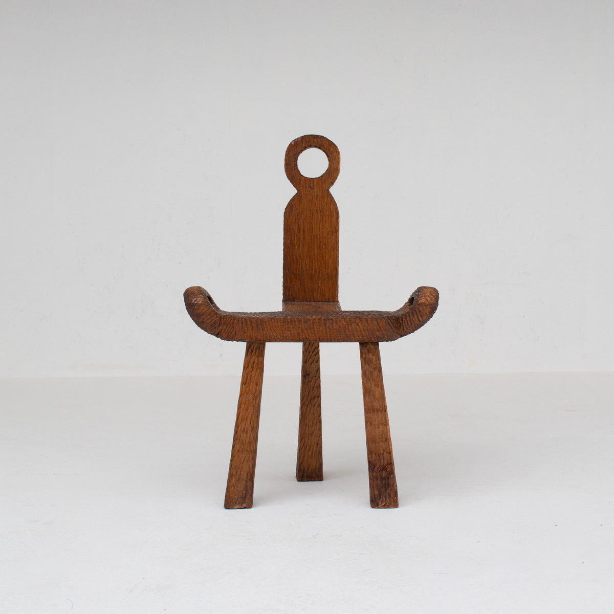 Brutalist Wooden Chair — front view on white background