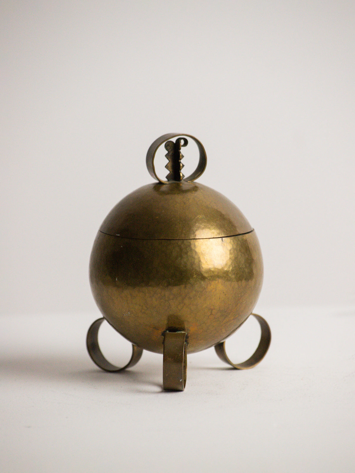 Hand Raised Brass Sphere Box with Toothed Zigzag Finial, Art Deco Style, Central European Workshop, circa 1930s — side angle