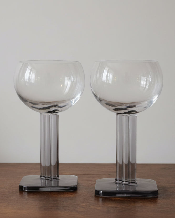 Pair of Italian smoked glass wine glasses with square base