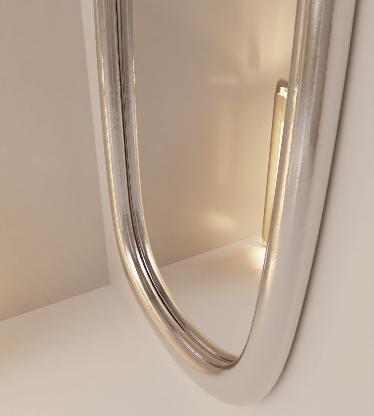 “Lago” Wall Mirror | Liquid Metal — side angle