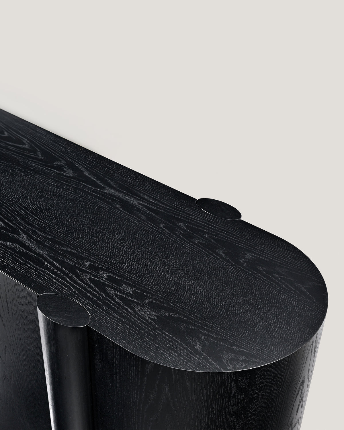 Era credenza cabinet detail showing curved black wood edges