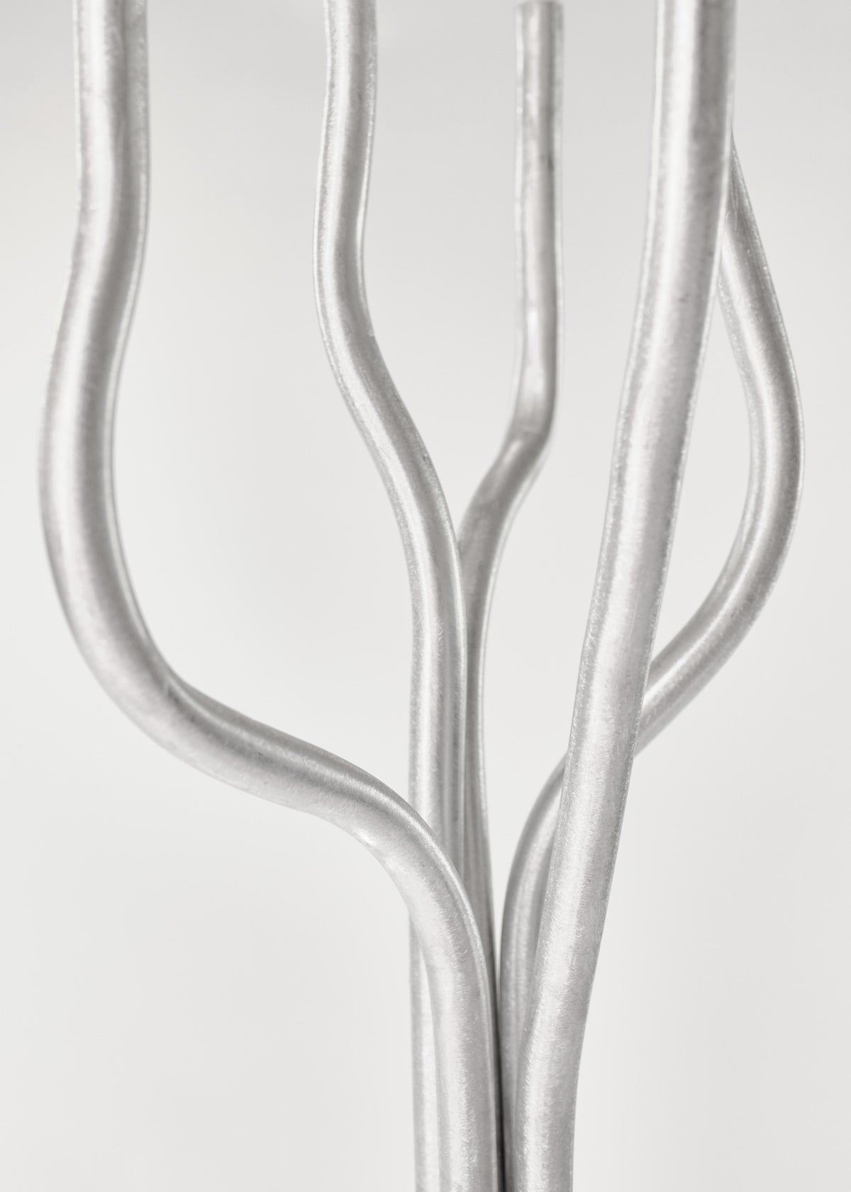 Tall Aluminum Candelabra — back view highlighting twisted metal design