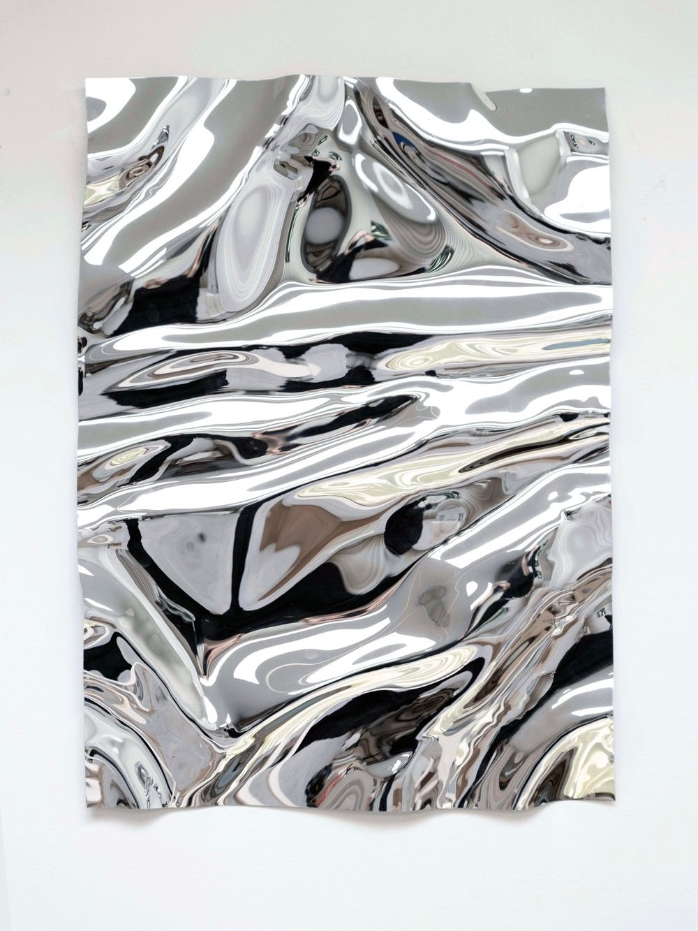 Psychedelic Mirror 75x100cm — side angle showing reflective silver surface
