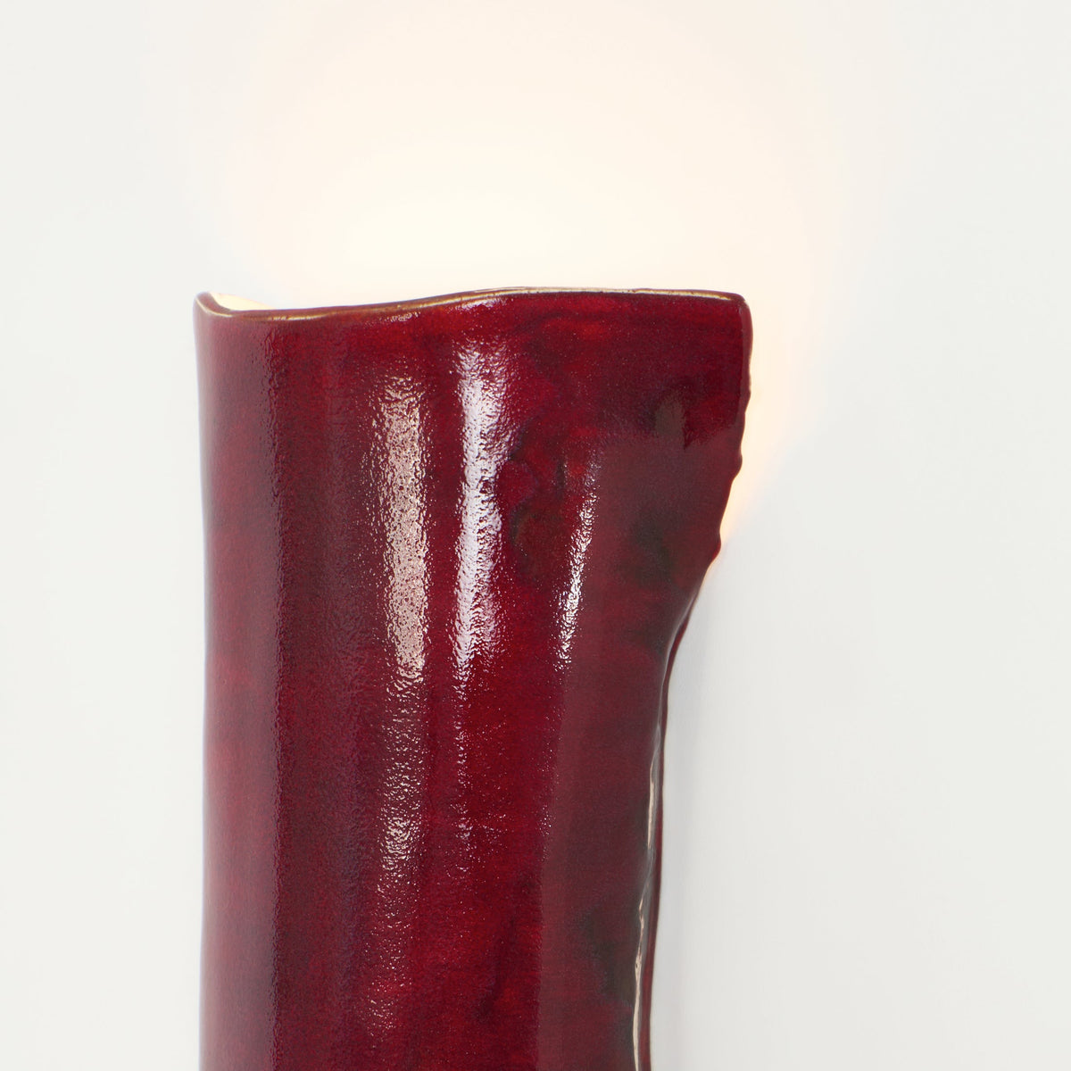 Papel Wall Light (X large) — close-up of red ceramic surface