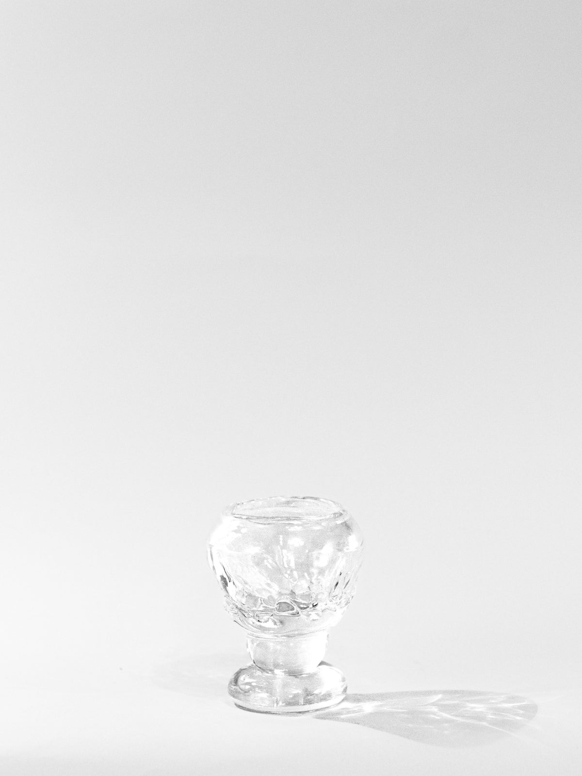 Organic Shaped Footed Table Glass — close-up of clear glass texture