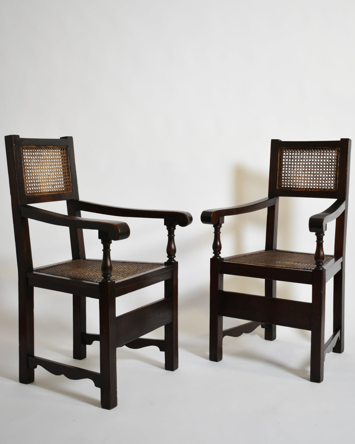Pair of turned wood and cane armchairs, 1910s by Barracuda Interiors | The Oblist — vintage dark wood finish