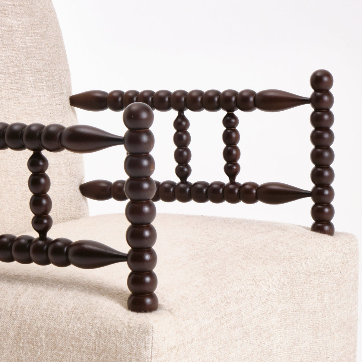 Bolha Lounge Chair — close-up of dark wooden armrest details