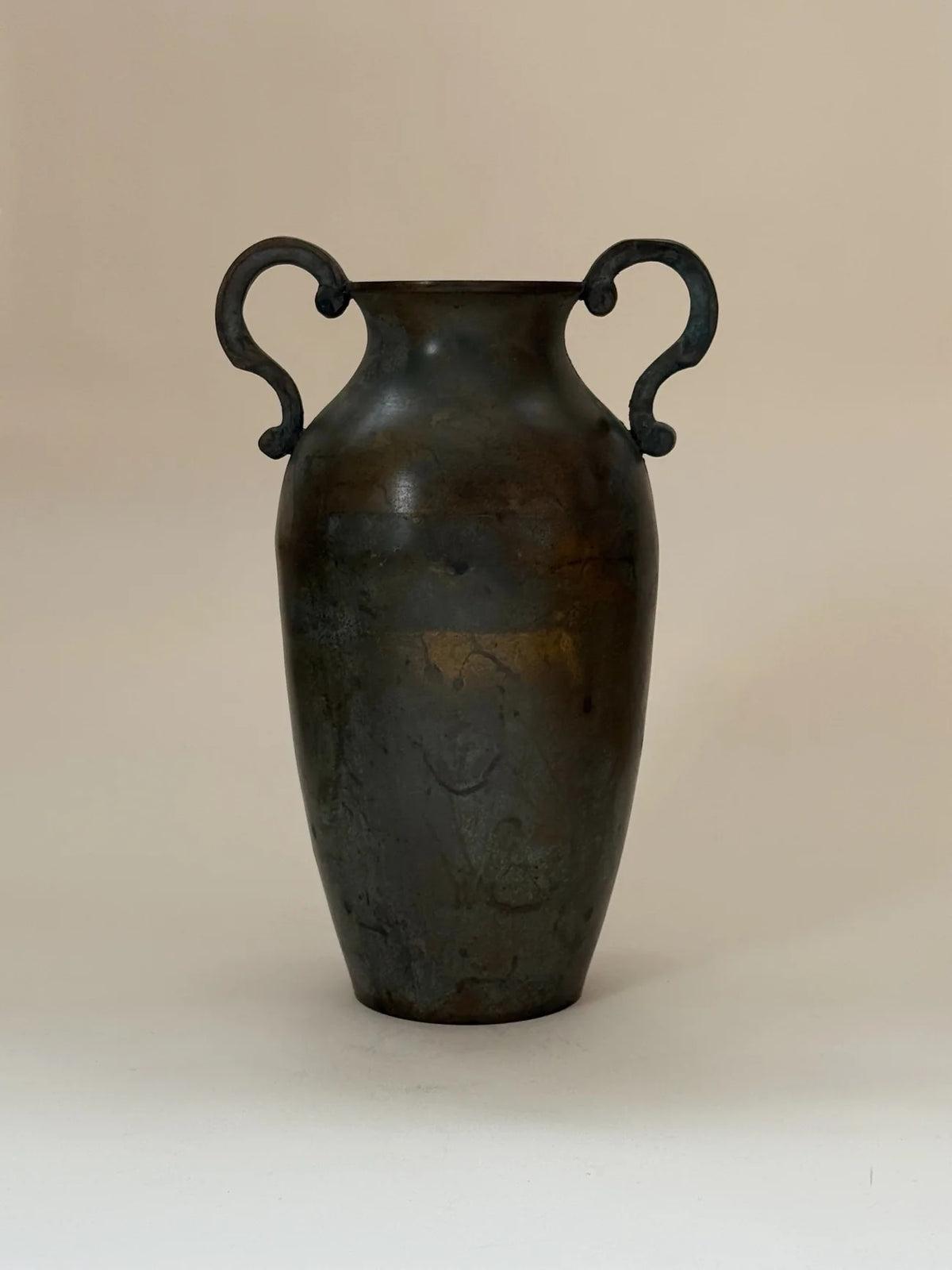 Bronze Amphora Vase — side angle showing curved handles and patina