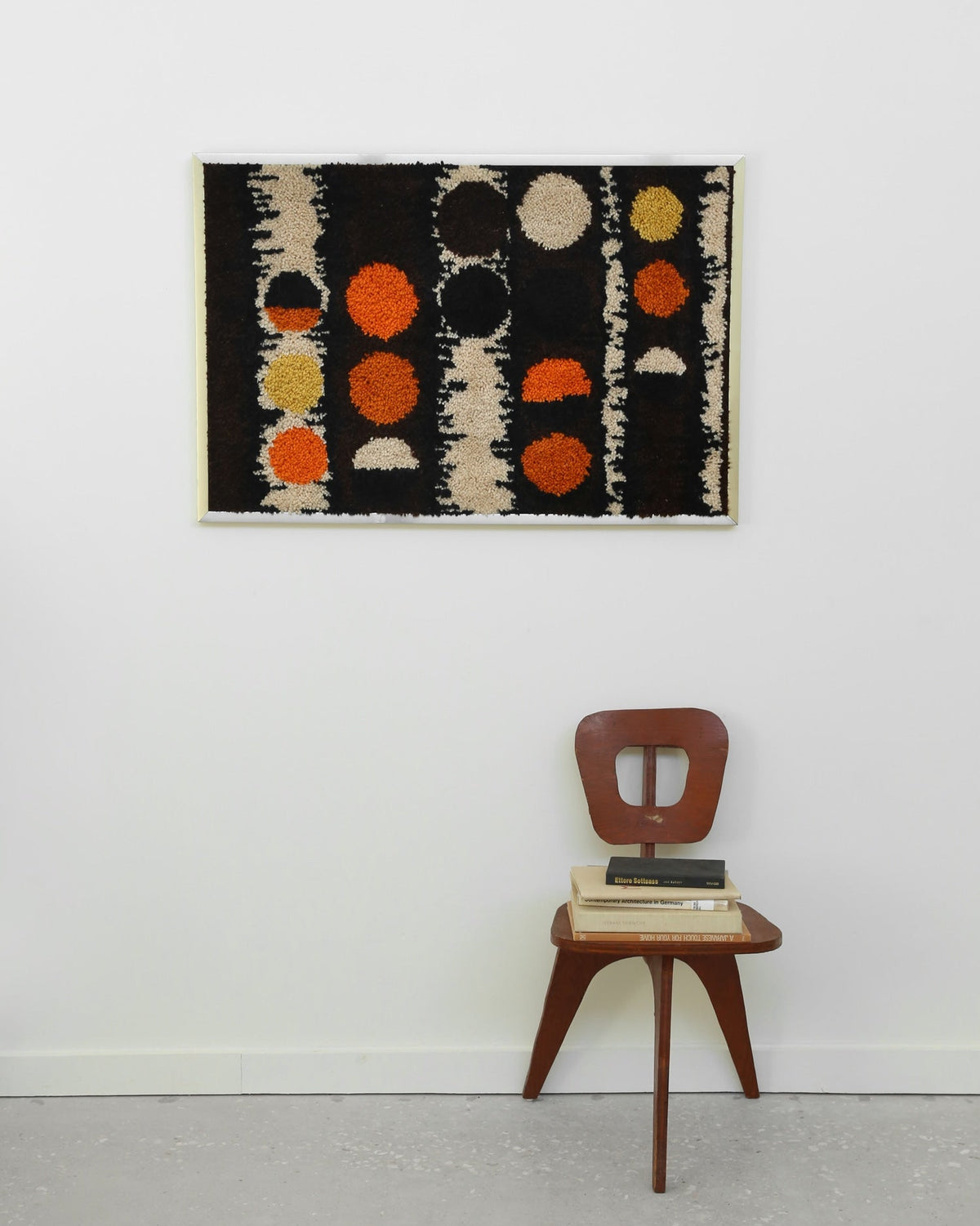 Scandinavian Textile Framed Art — detail of colorful textile on wall