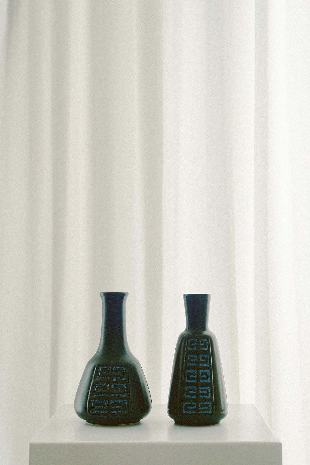 Danish Frank Keramic Bud Vase — side angle showing dark ceramic texture