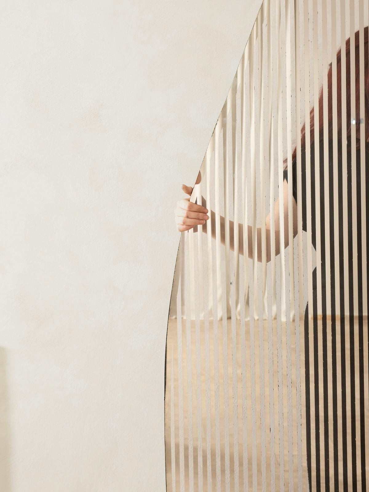 Line I Mirror — side angle showing reflective striped surface