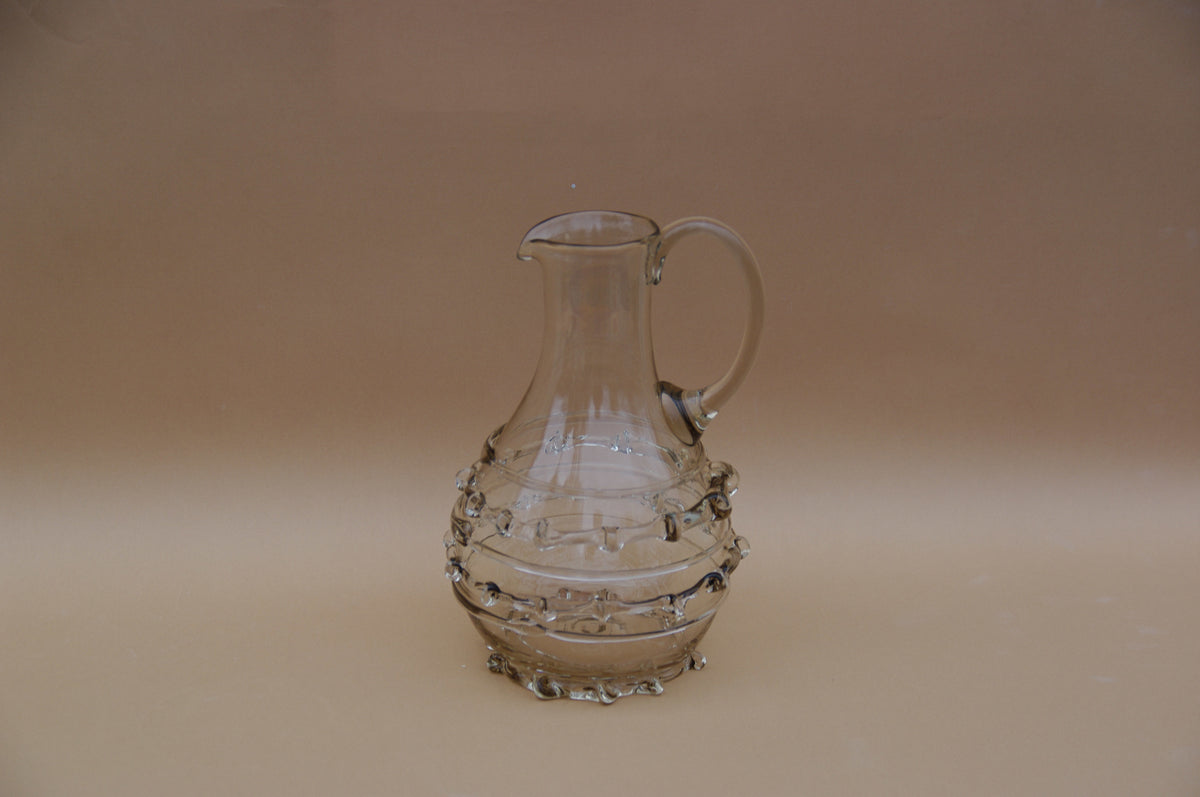 Contemporary Carafes in Glass with ornaments - Mouthblown Collection — side view highlighting glass texture and decorative el