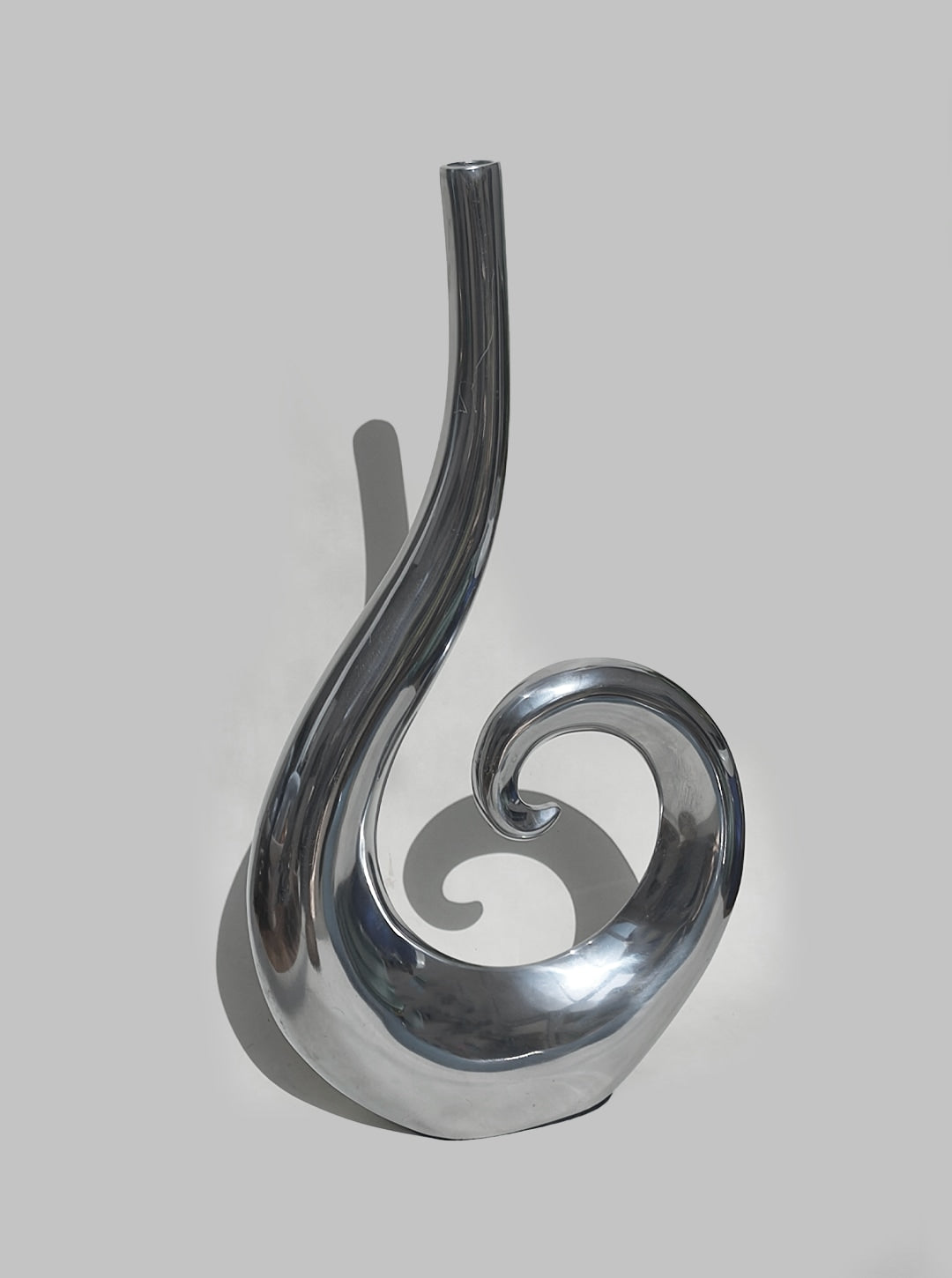 Large Spiral Vase — close-up of polished metal surface
