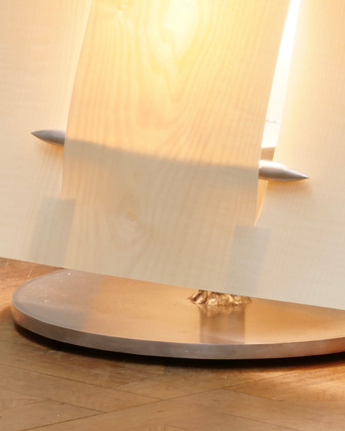 Soft Ply table lamp with white shade on circular base detail