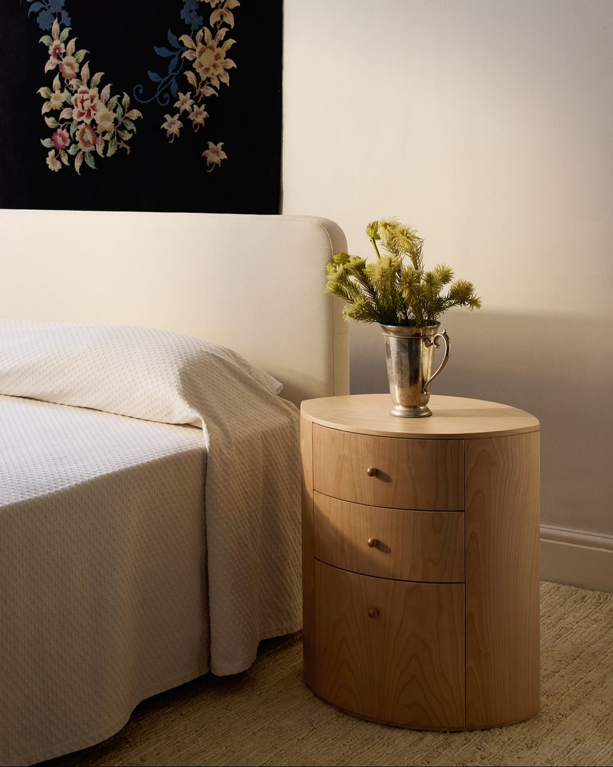 Observer nightstand in natural birch with three drawers and metal pitcher