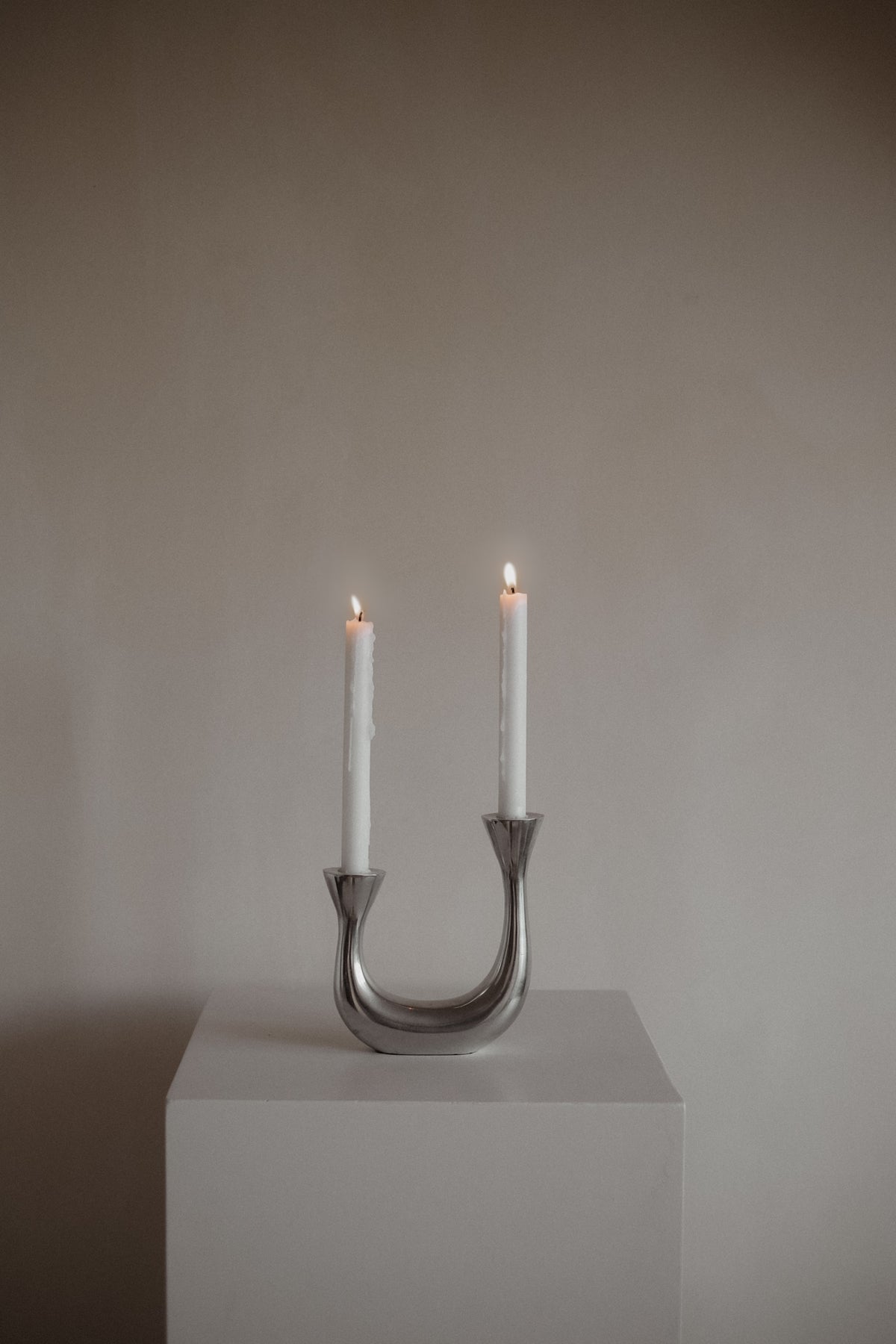 Sculptural Harmony Double Taper Candelabra — lifestyle setting