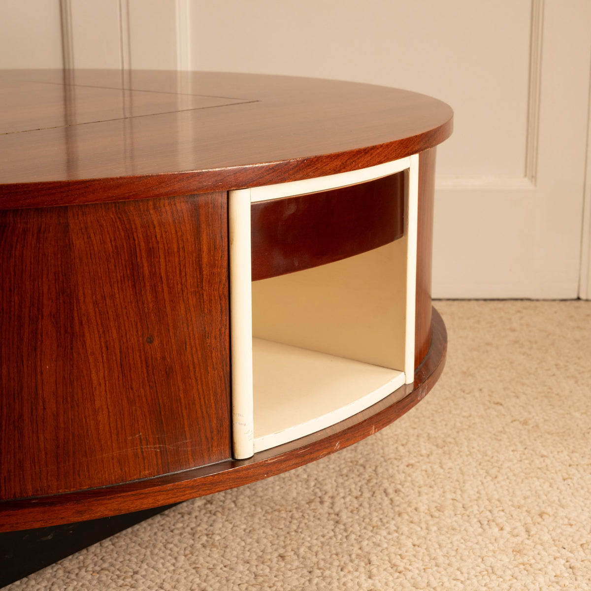 Swivel Coffee Table — close-up of wood finish with cream storage compartment
