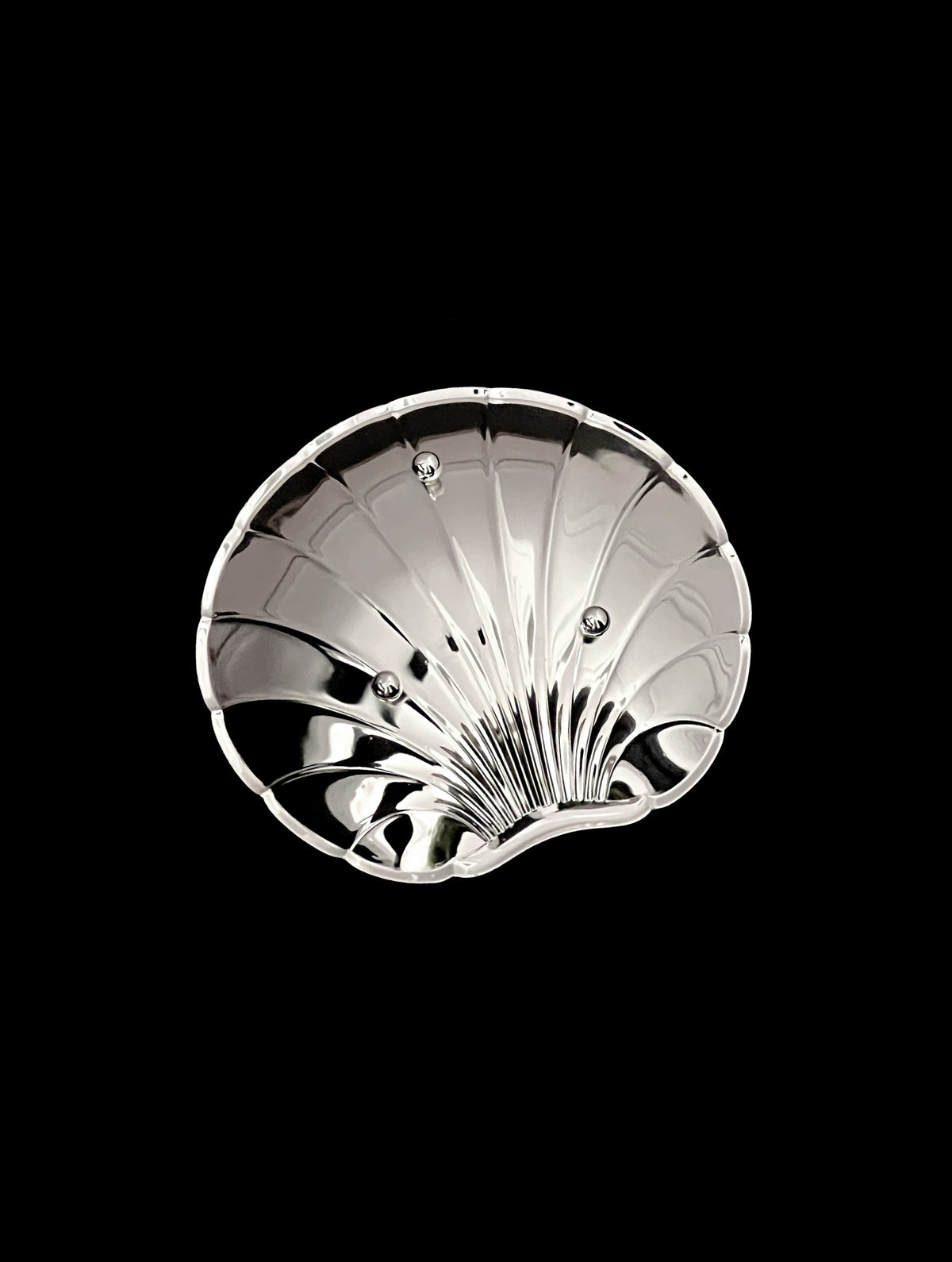 Vintage silver-plated shell dish detail view showing decorative ridged pattern