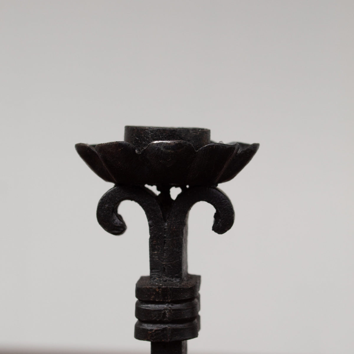 Pair of Brutalist Iron Candleholders with Sculptural Scroll Arms — alternate view