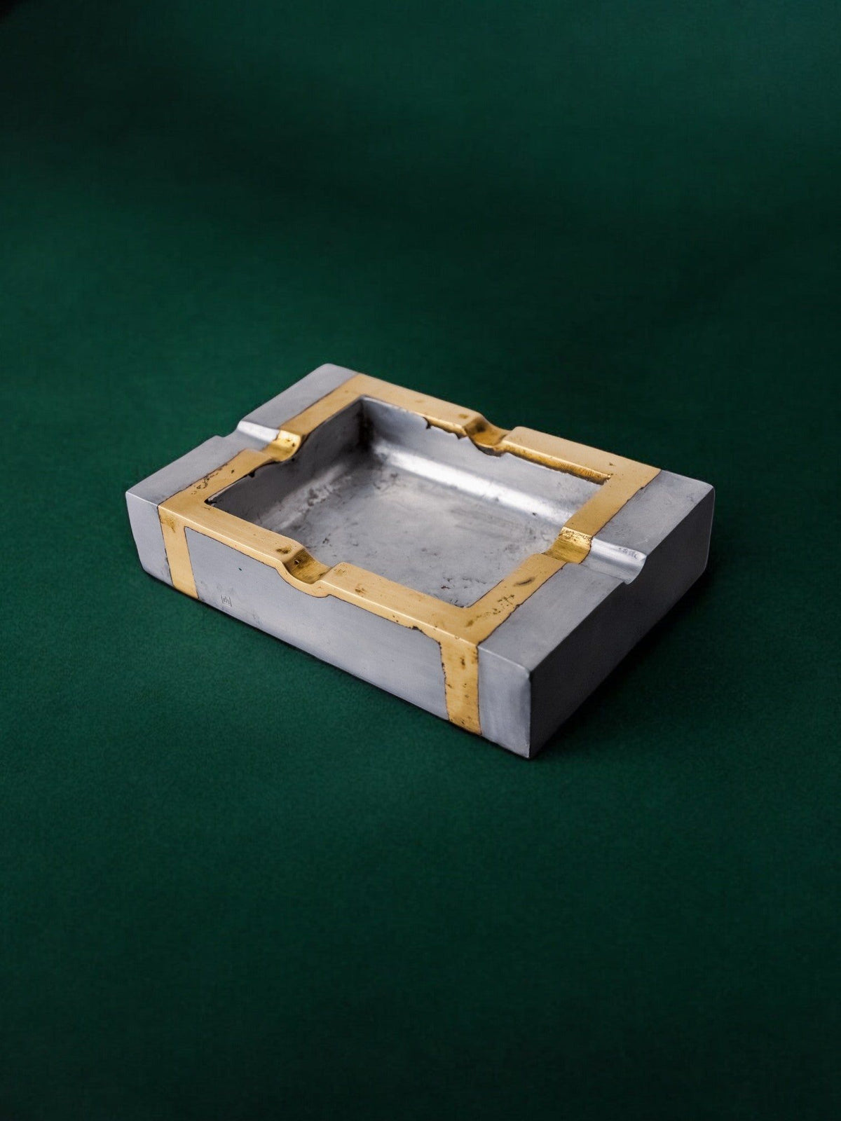 Brutalist Ashtray by David Marshall, 1970s — side angle on green backdrop