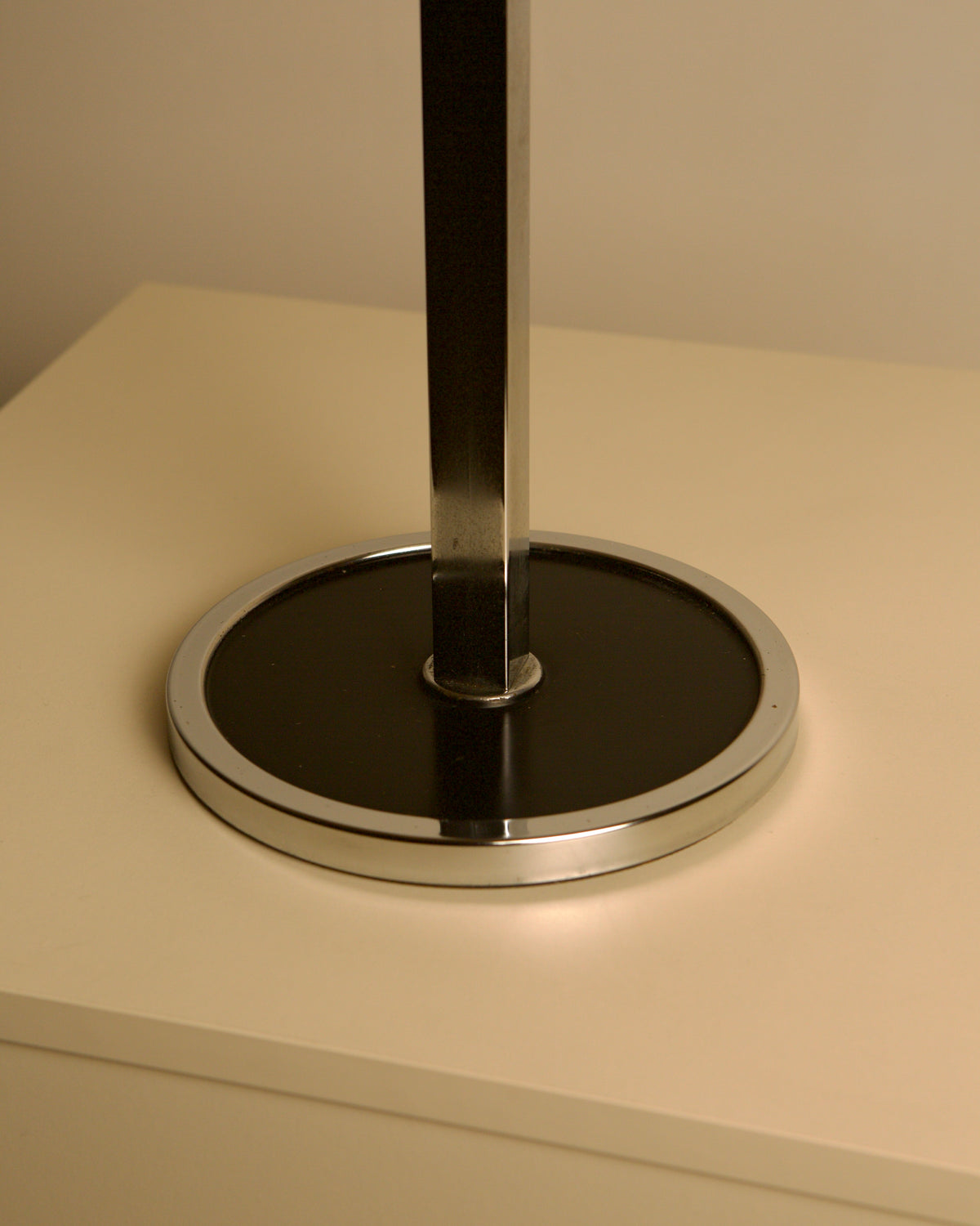 Italian Crystal Ashtray on a Chromed Metal Stand, 1950s — close-up of chromed base on neutral surface