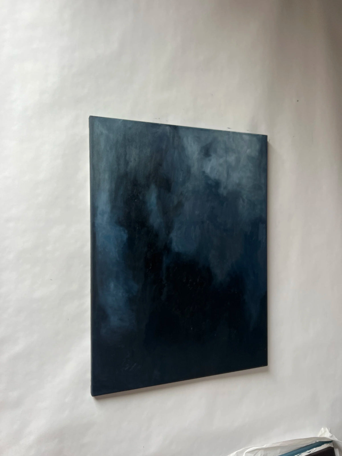 Oil Painting, Unfolding (2025) — side angle against white wall