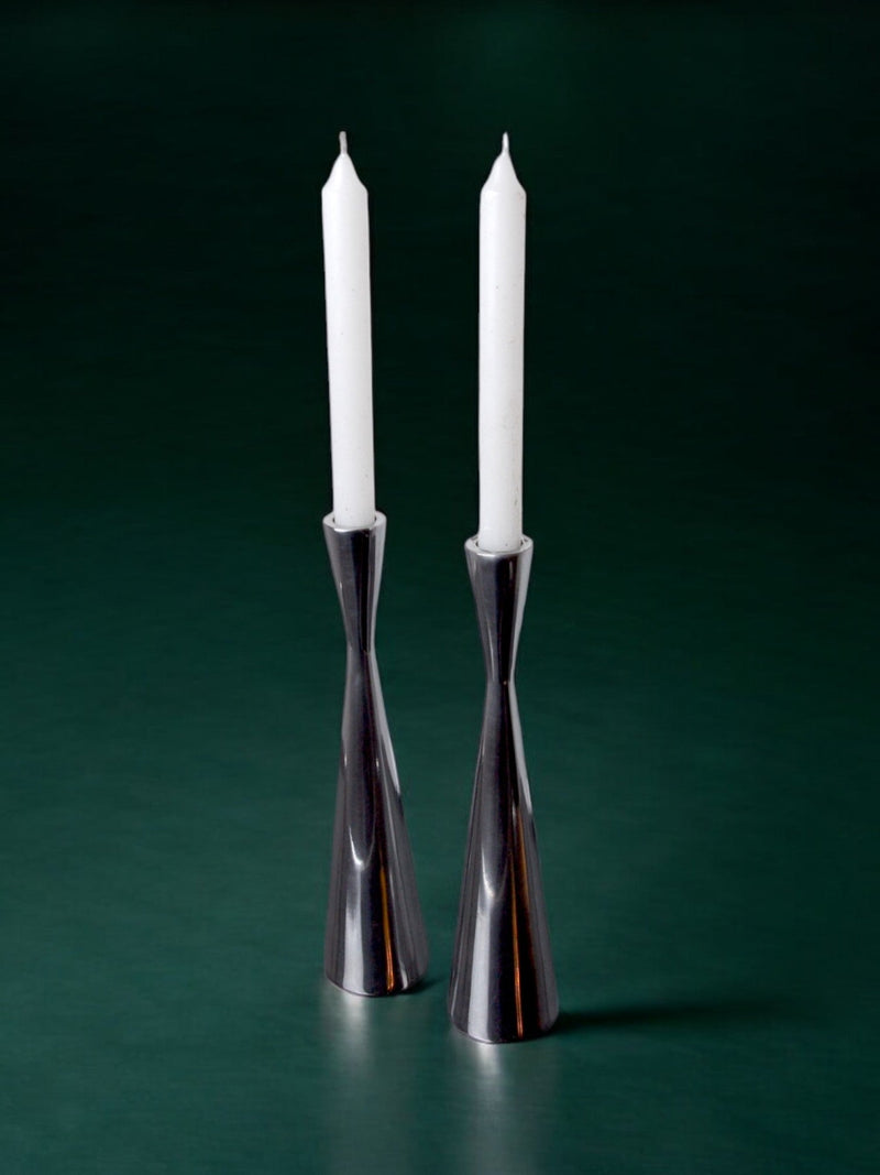 Pair of Scandinavian diabolo candlesticks, aluminium, suede, 1970 — detail view