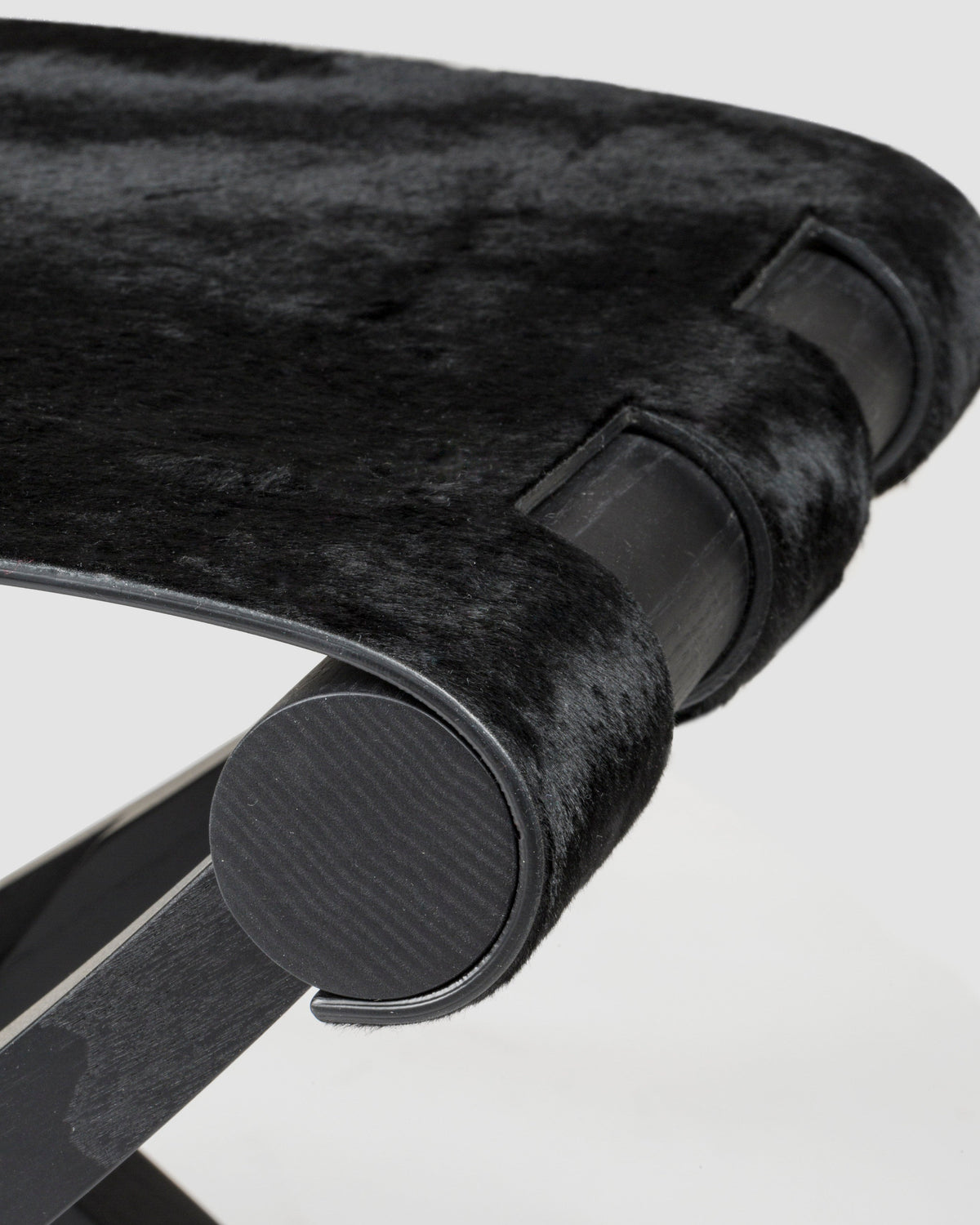 Close-up detail of Arturo folding stool hinges in antelope merino