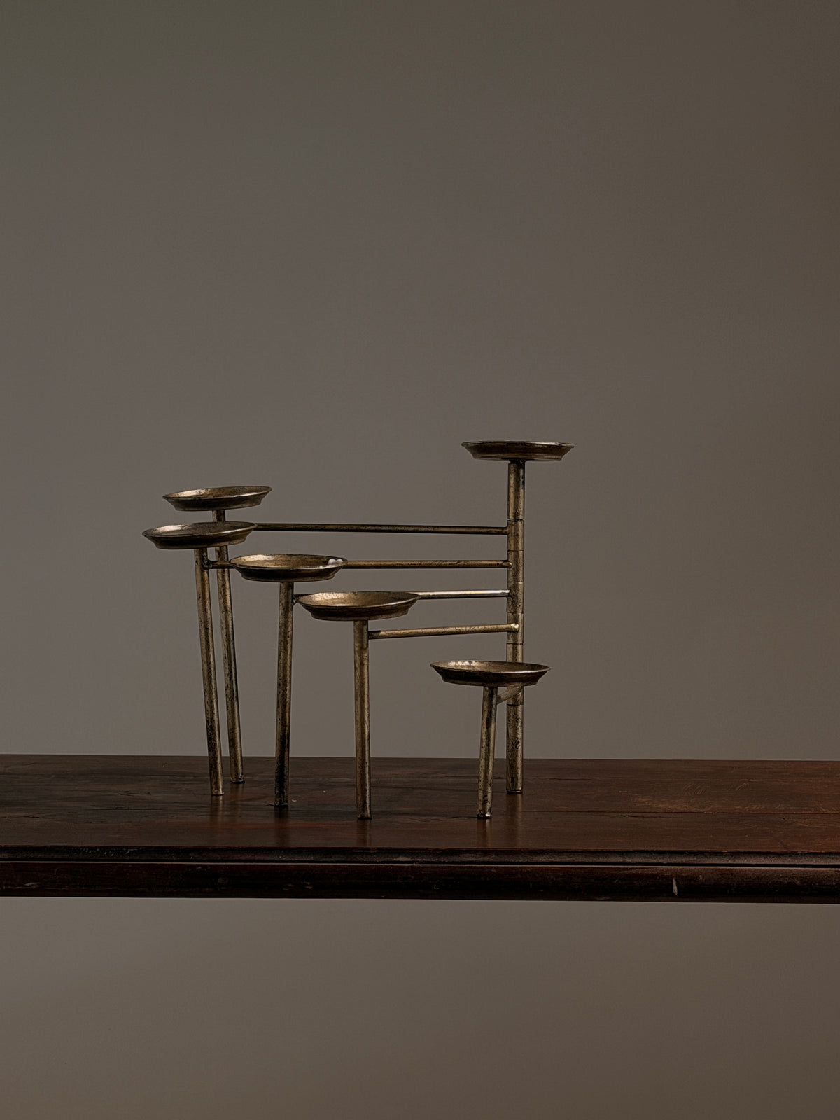 Articulated six-arm candelabra in silver-plated metal, France, circa 1950 — close-up