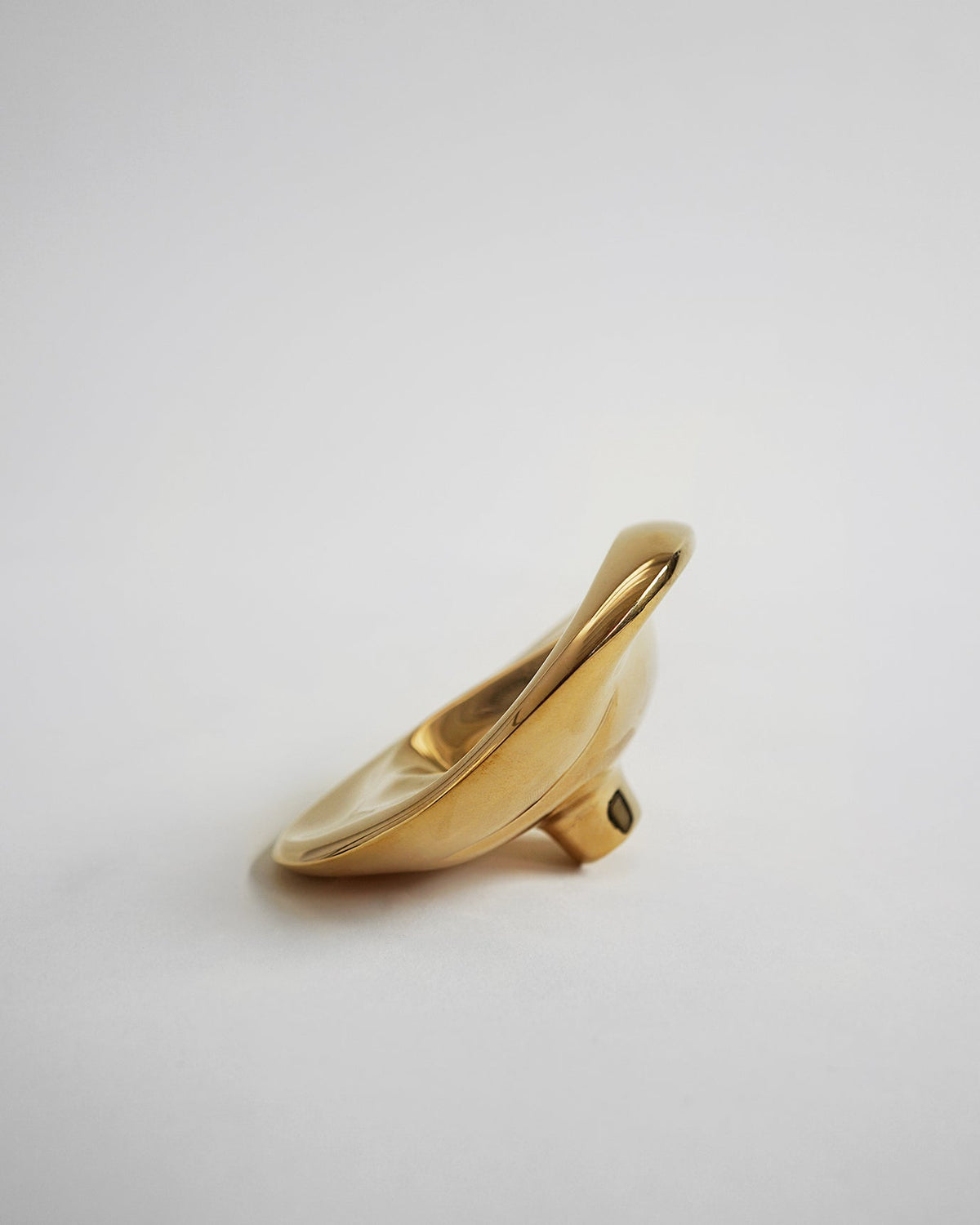 Ripple Hook - Large - Brass — side view highlighting smooth brass finish