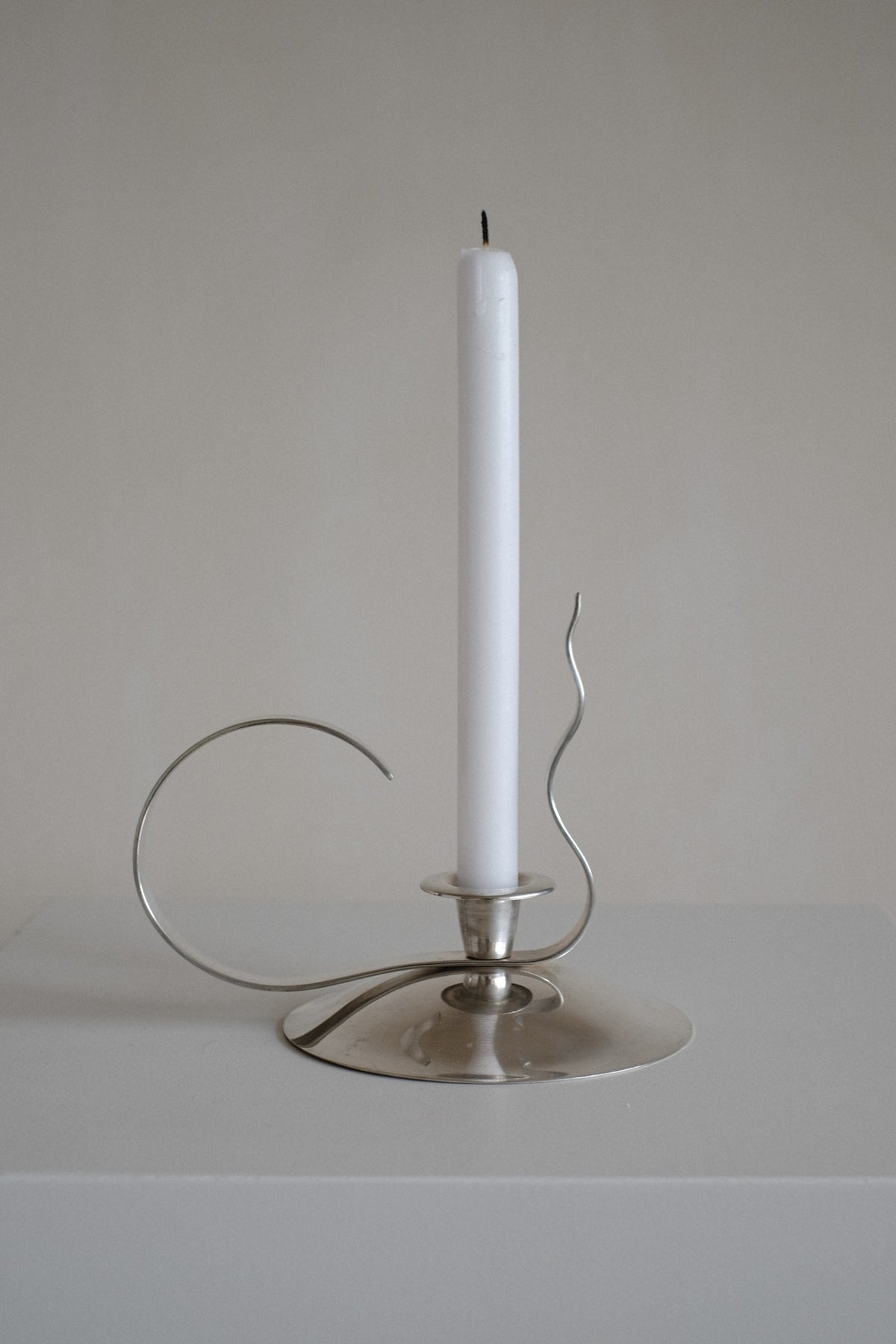 Silver-Plated Candle Holder — side view on minimalist surface
