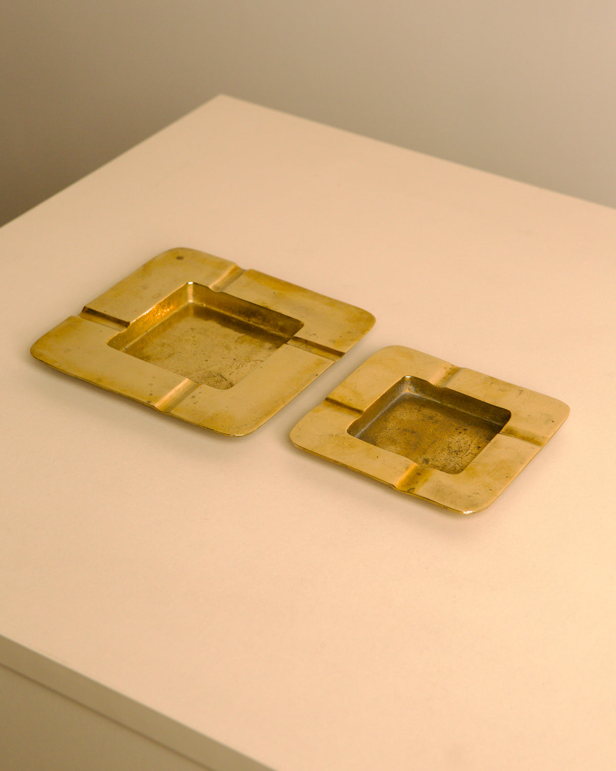 Pair of Italian hammered brass ashtrays, 1960s — detail view