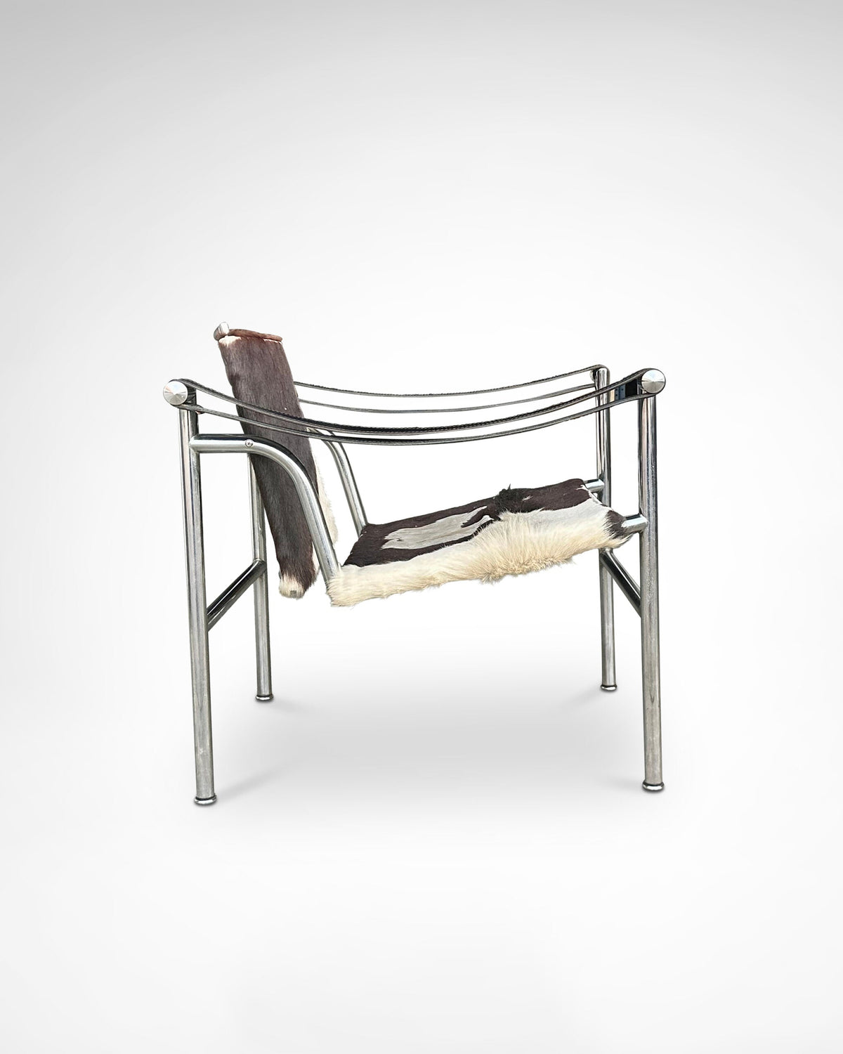 LC1 armchair by Le Corbusier, chrome steel frame and ponyskin, Cassina 1980s