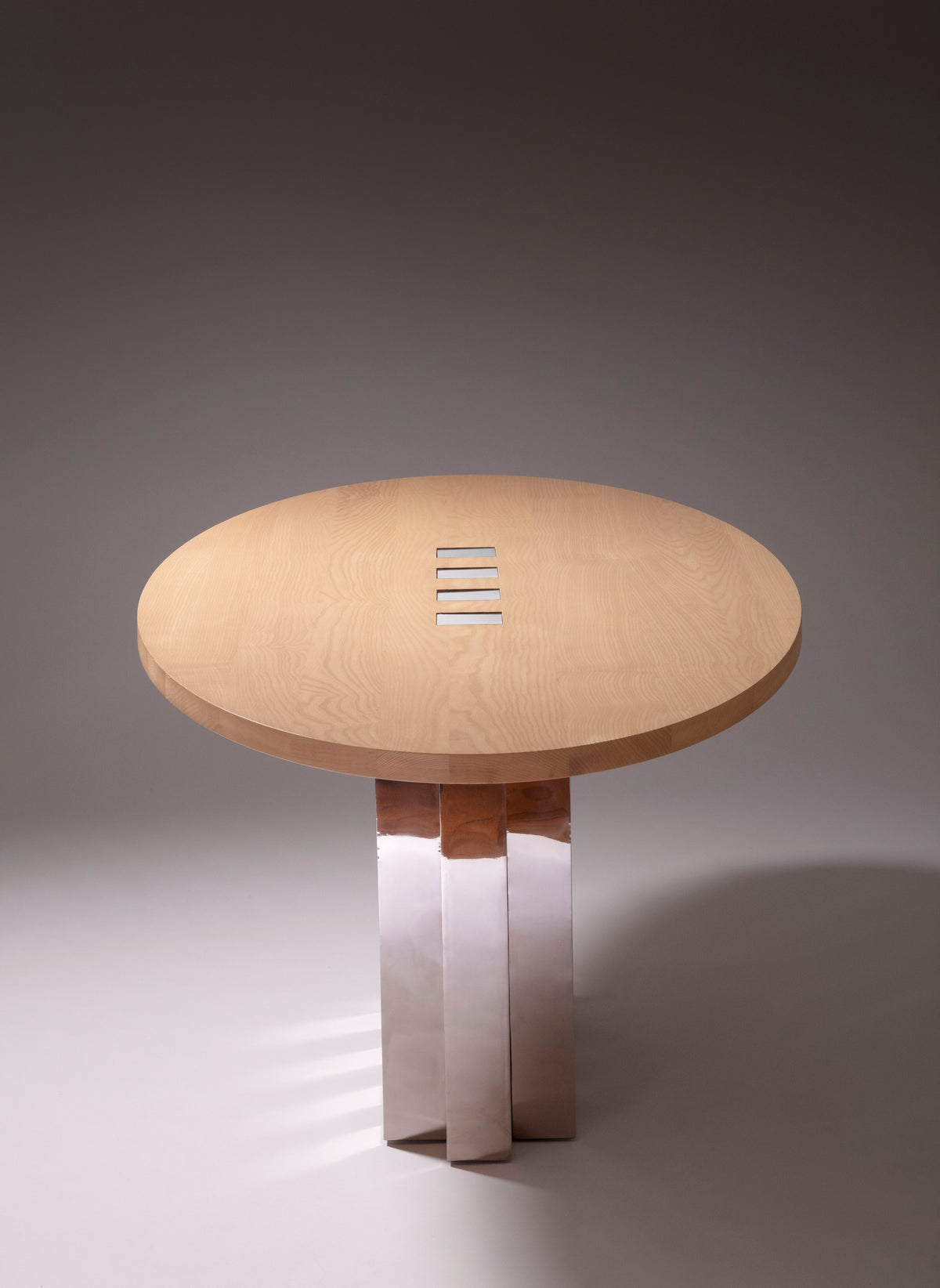 Oval dining table — side angle