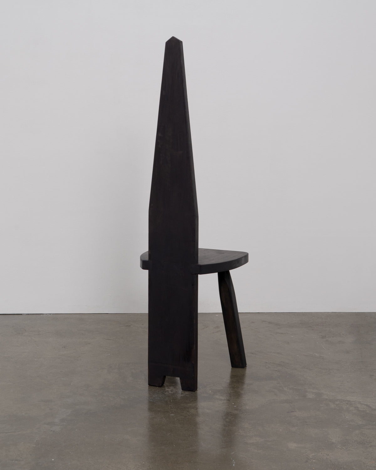 Brutalist High Back Chair — top view of dark wood seat
