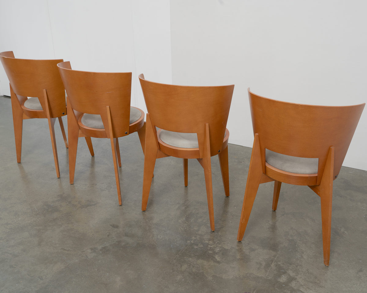 4 "Ola" Dining Chairs designed by Pascal Mourgue — rear view highlighting wooden finish
