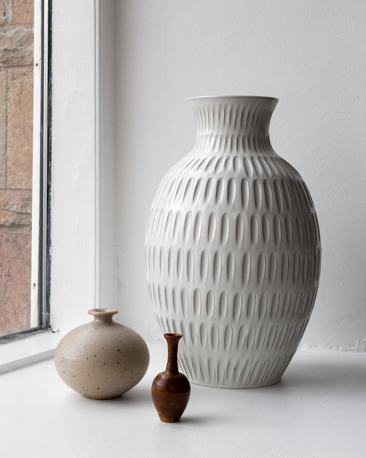 Anna-Lisa Thomson Floor Vase for Upsala-Ekeby, 1940s by Spigel | The Oblist — white ceramic, ribbed design
